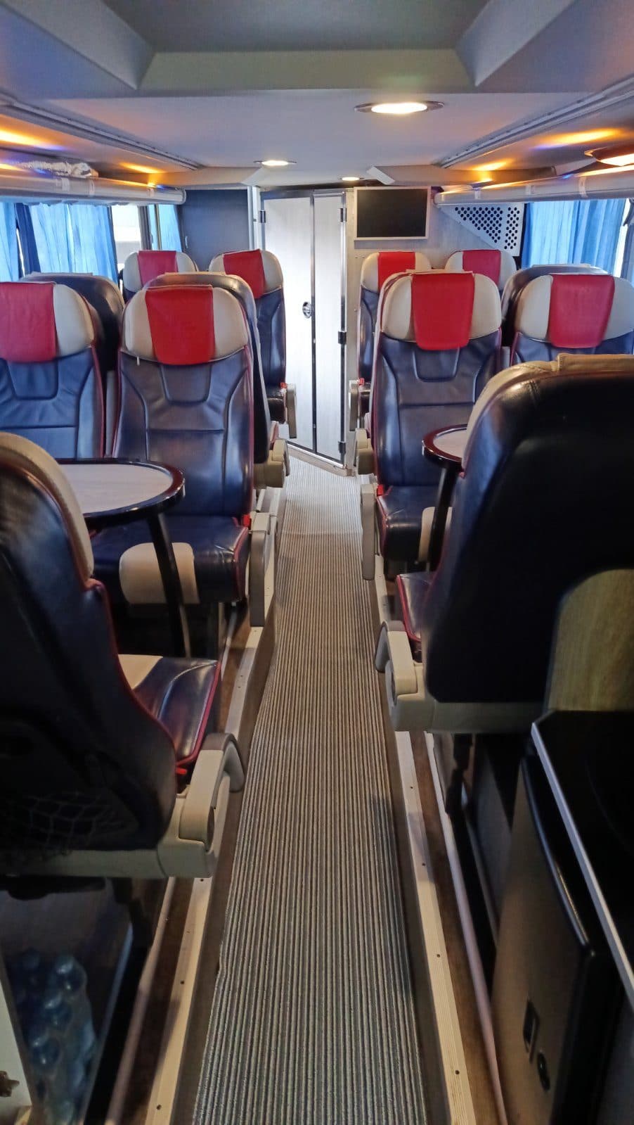 Lounge with tables inside the VDL Synergy VIP